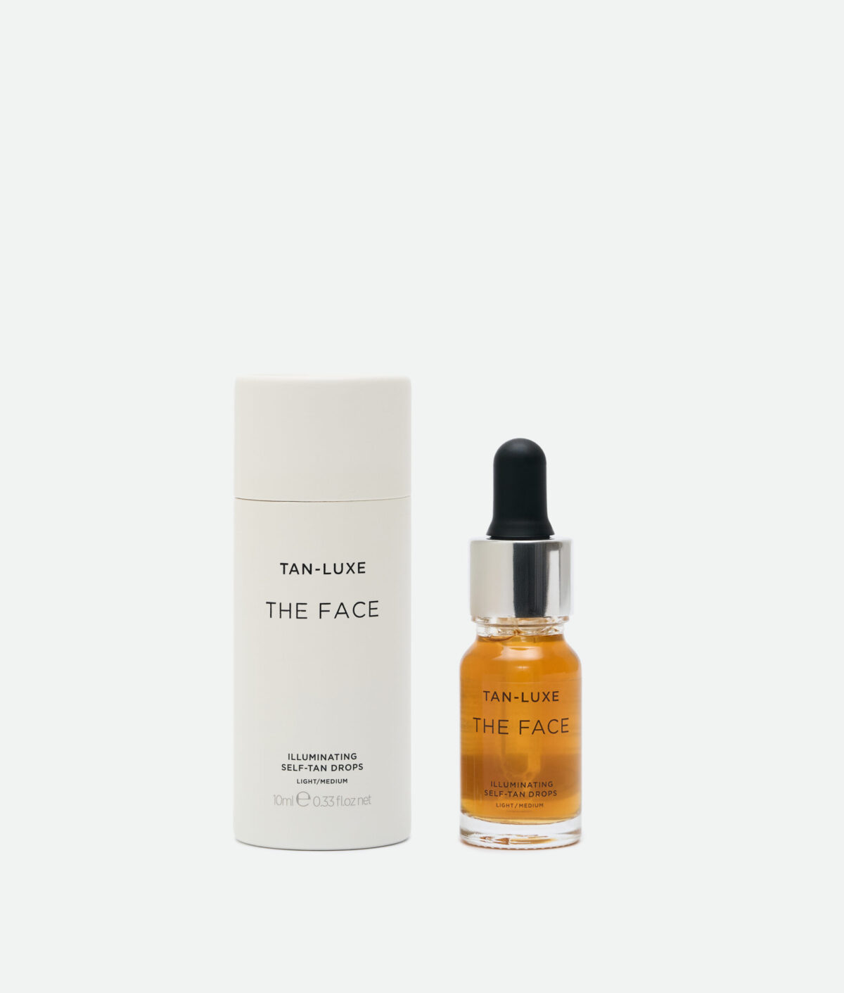 Краплі для автозасмаги обличчя у відтінку Light/Medium Tan-Luxe Face Illuminating Self-Tan Drops , 10 мл